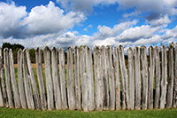 Wooden fence in front of the sky