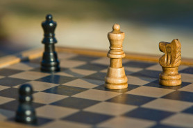 Four chess figures on the board